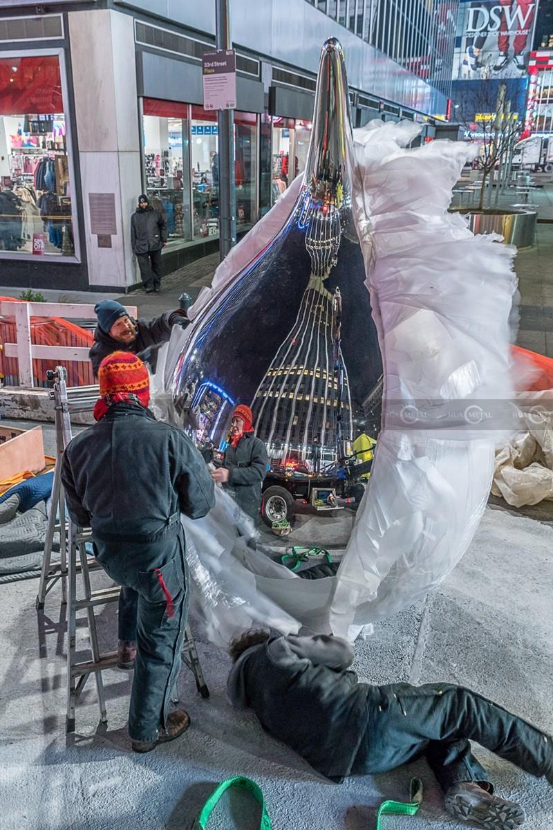 How-to-polishing-installation-of-mirror-stainless-steel-sculptures