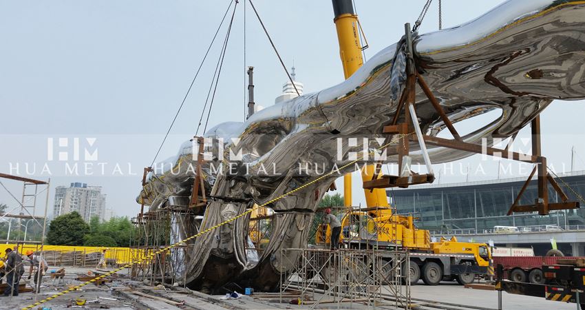 on site installation of Fantasy Boat sculpture